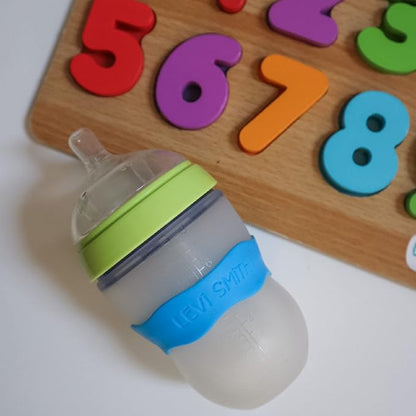 InchBug Orbit Labels - Baby Bottle Name Labels for Daycare, Sippy Cup Bands - Engraved Silicone, Reusable, Dishwasher Safe, Matching Color Personalization, 4-Pack (Deep Sky Blue)