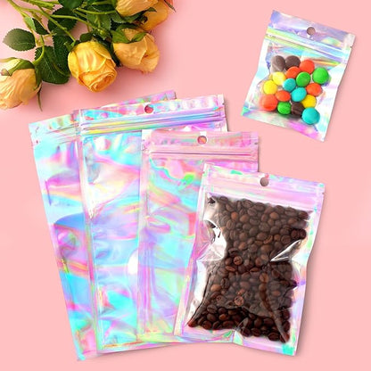 Funfery 100 Pcs Smell Proof Holographic Bags Clear Window Resealable Bags,Mylar Foil Bag with Zipper,Sealing Pouch Packaging Bag for Food Storage,Candy,Party Favor Sample Business Supplies(6.3x9.4in)